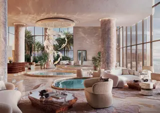 AMRA — grand lobby with water feature and lounge