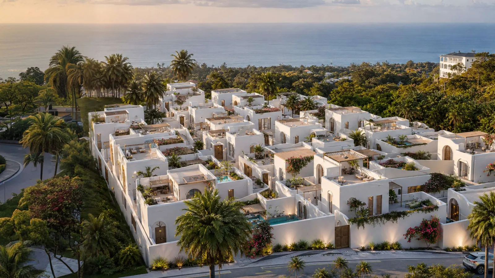 EDEM II, an aerial view of white Santorini-inspired villas among palm trees in Nusa Dua, Bali