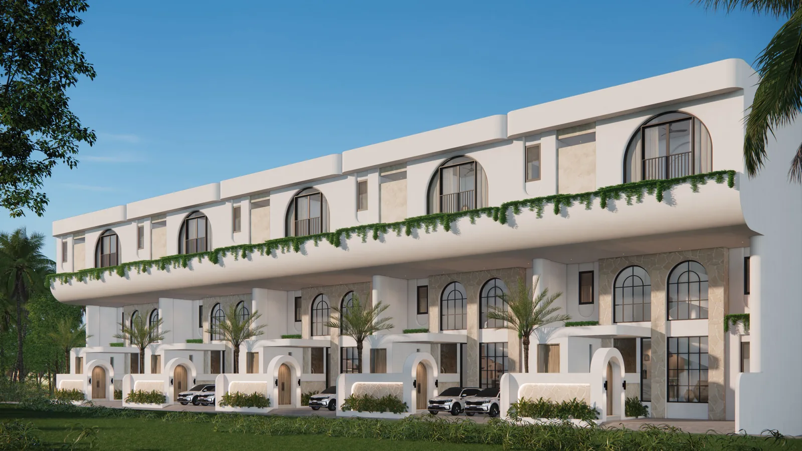 Elements Villas, a row of white Mediterranean-style duplex villas near Dreamland Beach in Bali