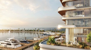 Wave-like façade of LIV Oceanside overlooking the marina and sea